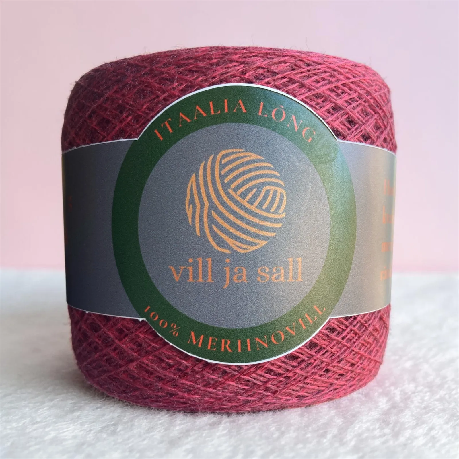 M9, camelia rose (variegated), a ball of merino wool yarn